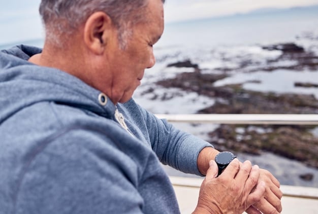 A close-up shot of a senior man wearing a smartwatch that is monitoring his heart rate. The watch screen is clearly visible, displaying the heart rate reading. The background is blurred, suggesting he is in a home environment.