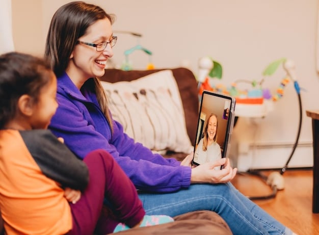 A parent is assisting their child with a telehealth speech therapy exercise on a tablet. The therapist is guiding them through the session, providing instructions and feedback to both the parent and the child.